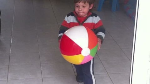 Thumbnail for Aviv throwing a ball ...