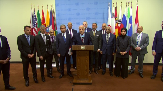 Riyad H. Mansour (Palestine) &amp; members of the Arab Group following the adoption of the Middle East Resolution - Security Council Media Stakeout