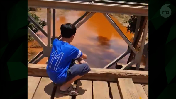 River in Laos turns dark orange due to pollution from upstream iron mines