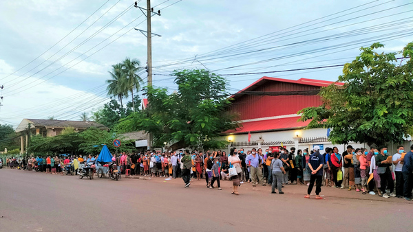 Long lines for passports in the Lao capital