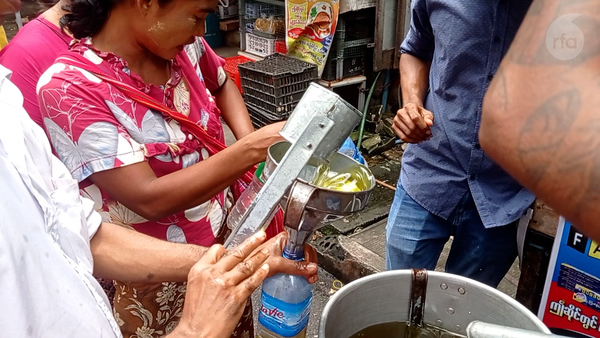 Soaring palm oil prices prompt long lines in Myanmar