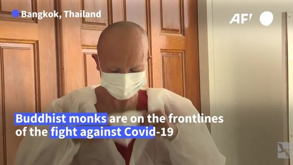 Thai Monks Don Protective Gear to Help In Fight Against COVID-19