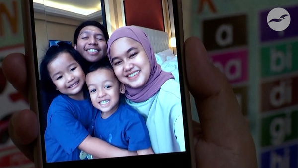 Indonesian mother grieves toddler son's death from tainted cough syrup