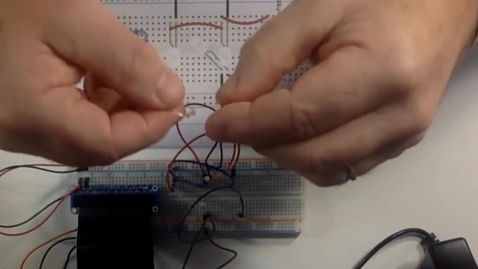 Thumbnail for entry Switch + 3 LEDs Step: Adding 560 Ohm Resistor