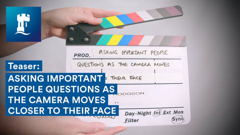 Thumbnail for Teaser | Asking important people questions as the camera moves closer to their face