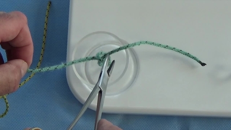 Thumbnail for Using instrument tie to perform a square knot down a hole