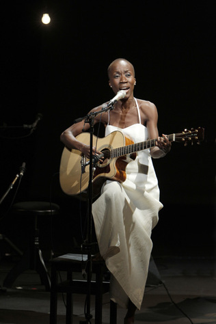 Figure 3. Rokia Traore Seated with Guitar