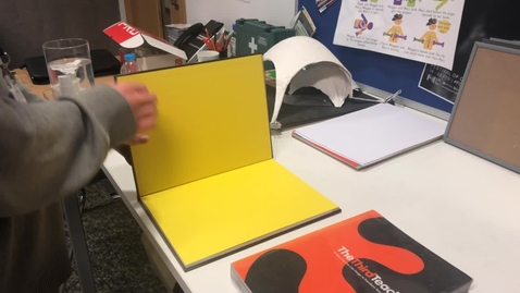 Thumbnail for UCreate Student Opening a Book