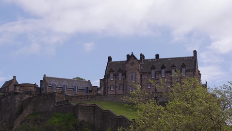 Thumbnail for Edinburgh Castle against blue sky pan left