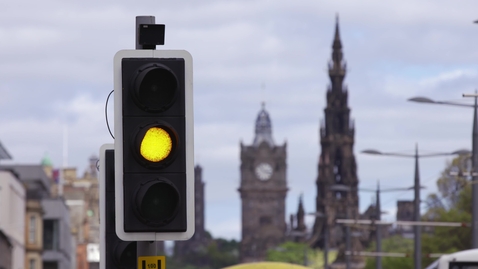 Thumbnail for Traffic light transition in Edinburgh cityscape