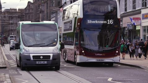 Thumbnail for Edinburgh Princes Street street with buses and cyclists