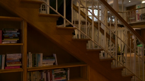 Thumbnail for Walking up bookcase stairs