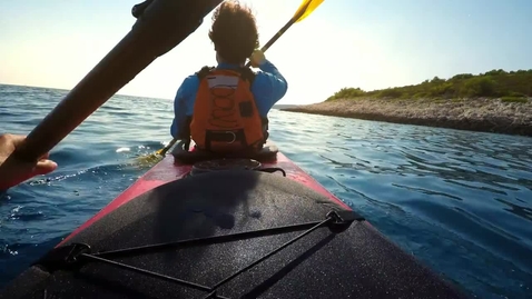Thumbnail for Kayak gliding across the water