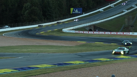 Thumbnail for Cars racing on a track