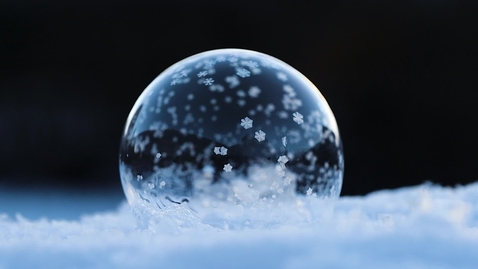 Thumbnail for Soap bubble freezing to ice