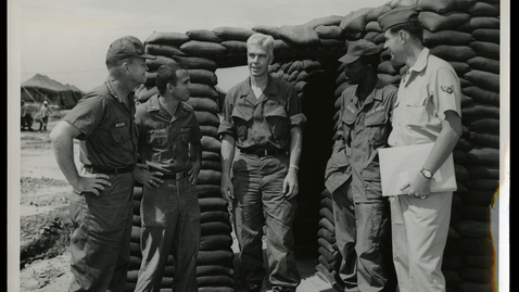 Thumbnail for entry Senator Peter H. Dominick discusses sandbag bunkers with United States Air Force airmen from Colorado at Bien Hoa Air Base, Vietnam, 1967