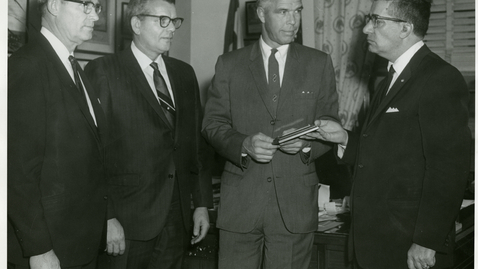 Thumbnail for entry Senator Peter H. Dominick accepts a plaque from Robert M. Gjonovich, District President of the National Association of Post Office and General Service Maintenance Employees in February 1968, 1968 February 14