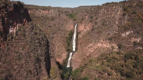 Miniatura para waterfall-landing-in-a-small-body-of-water-526
