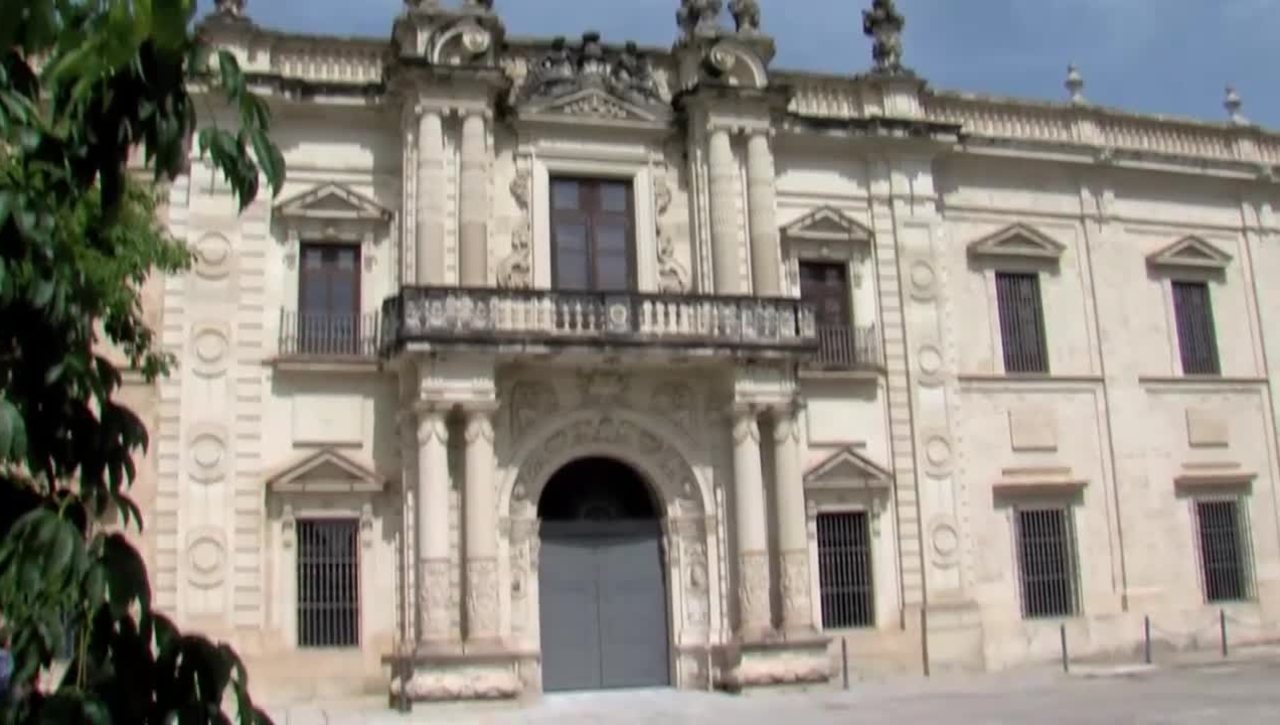 APERTURA DE LA PUERTA ESTE DE LA REAL FABRICA DE TABACOS DE SEVILLA. FACHADA DE LA AVENIDA DEL CID (ANTIGUA FACULTAD DE DERECHO)