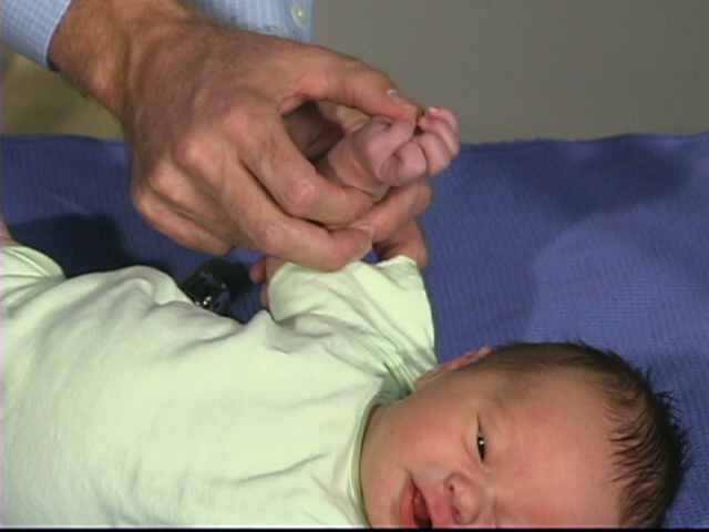 Infant opening and closing hands shop